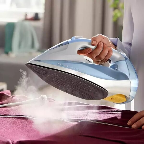Philips Steam Iron 2600W 300ml, 220g Steam Boost, Quick Calc Release and SteamGlide Plus Soleplate, 7000 Series Blue DST7011