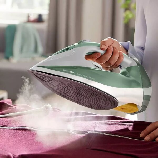 Philips Steam Iron HV 2600W 300ml , 220g Steam Boost, Quick Calc Release and SteamGlide Plus Soleplate, 7000 Series Green DST7012